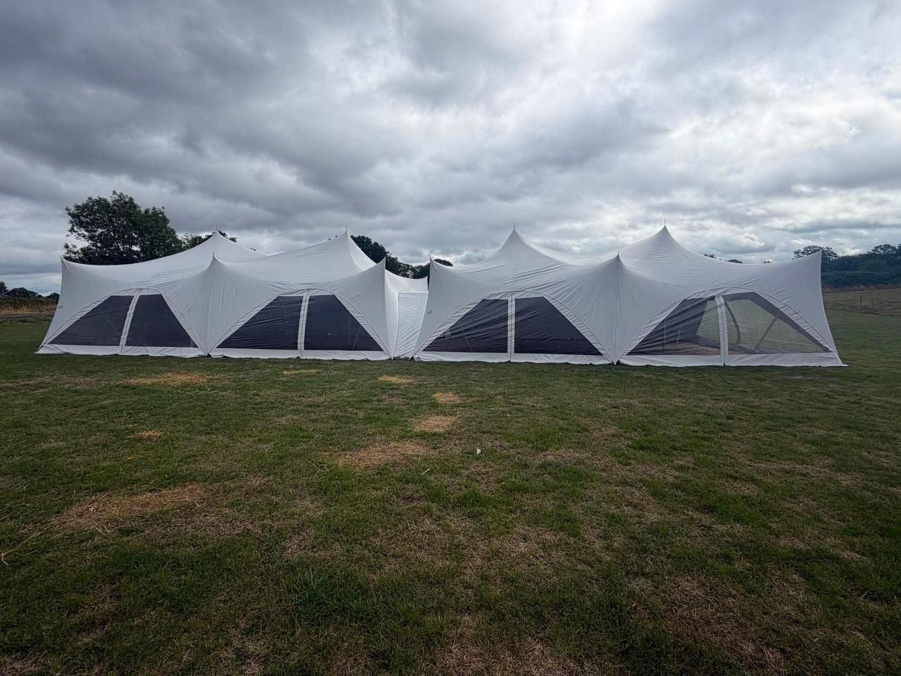 Two 28ft x 38ft Capri marquees linked together with panoramic windows